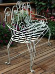 John Risley style wrought iron patio bench