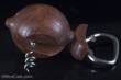 Teak fish bottle opener and corkscrew